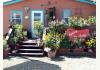 Cimarron Inn: Office and porch in the summer