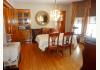 The Freeman House: Formal dining room with bay windows